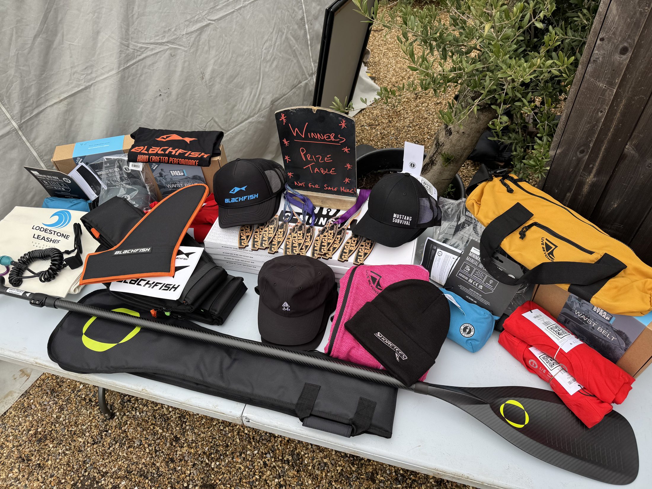 Prizes and kit laid out on the prize table at a previous edition of GLAGLA UK